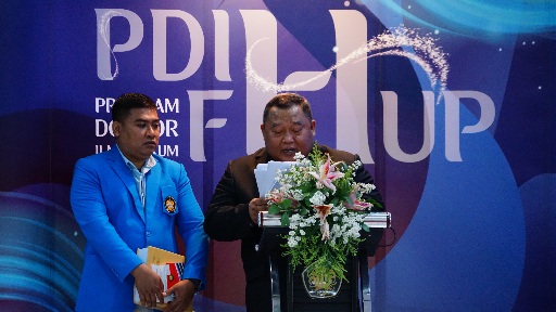 Anggota KPPU Budi Joyo Santoso Raih Gelar Doktor dari FHUP, Ini Hasil Disertasinya