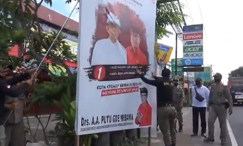 Penertiban Baliho Kampanye di Denpasar Diwarnai Protes Tim Sukses