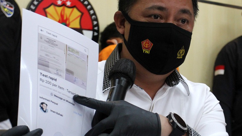 Polda Jatim Tangkap Pembuat Dokumen Rapid Test Antigen Palsu - Bagian 1