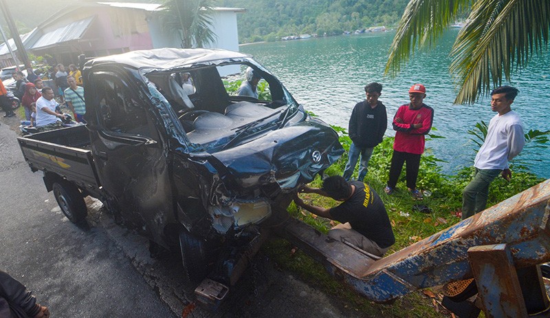 Kecelakaan Mobil Masuk ke Laut di Padang, 3 Penumpang Hilang - Bagian 1