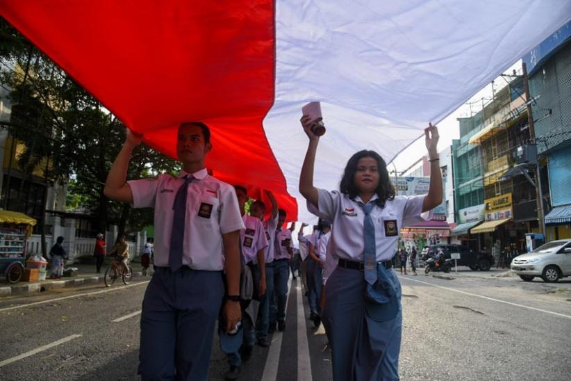 Ratusan Pelajar hingga Prajurit TNI Bentangkan Bendera Merah Putih Sepanjang 150 Meter di Medan - Bagian 2