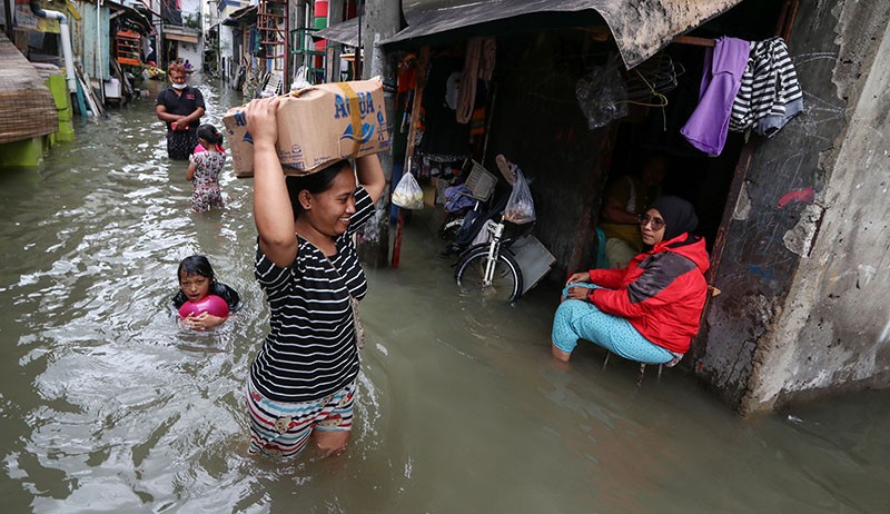 82 RT di Jakarta Banjir, Ketinggian Air hingga 1,8 Meter - Bagian 2