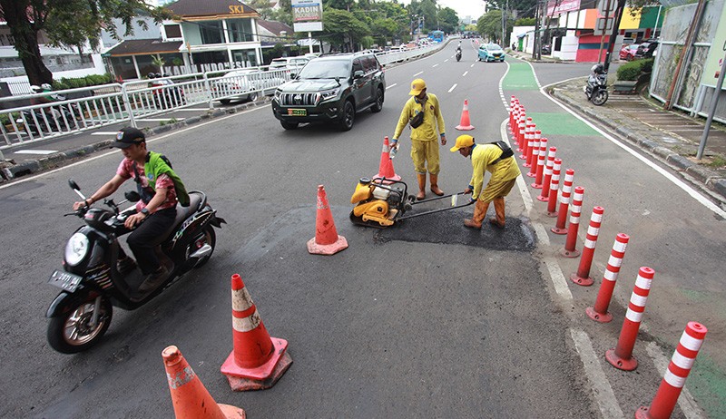 Pengaspalan Jalan Rusak di Ibu Kota Sepanjang 115 Kilometer - Bagian 1