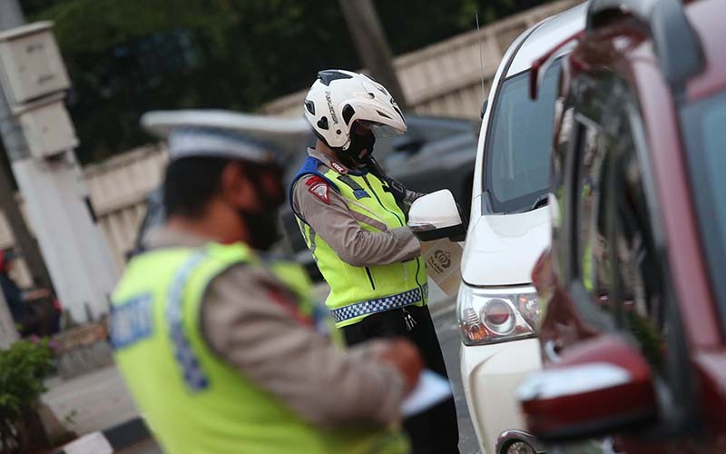 Polisi Kembali Berlakukan Tilang Manual - Bagian 4