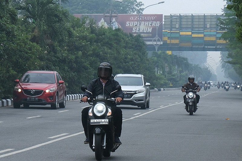 Kabut Asap akibat Karhutla Ganggu Aktivitas Masyarakat Kalimantan Barat - Bagian 2