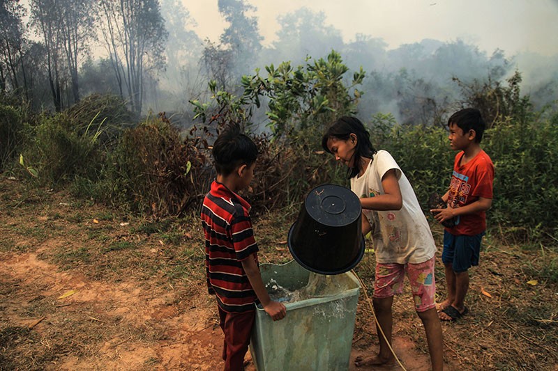 Begini Semangat Anak-Anak Palembang Jaga Sekolah dari Kebakaran Lahan - Bagian 2