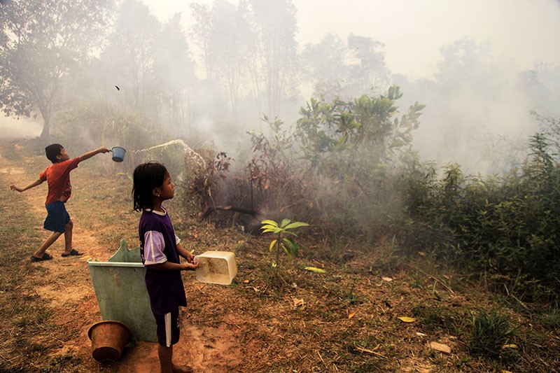 Begini Semangat Anak-Anak Palembang Jaga Sekolah dari Kebakaran Lahan - Bagian 1