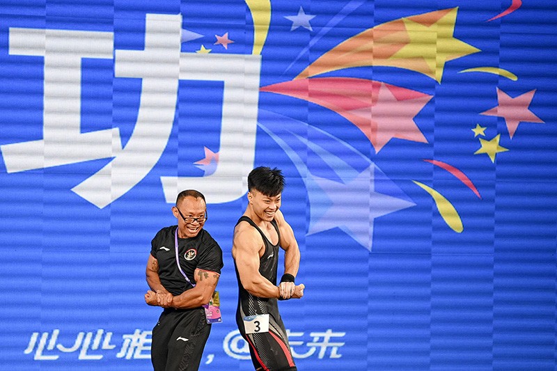 Pecahkan Rekor, Lifter Rahmat Erwin Abdullah Sumbang Emas ke-5 untuk Indonesia - Bagian 3
