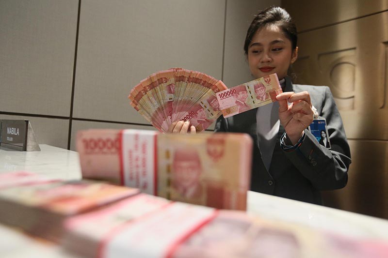 Rupiah Ditutup Melemah, Rp15.644 per Dolar AS Sore Ini  - Bagian 1