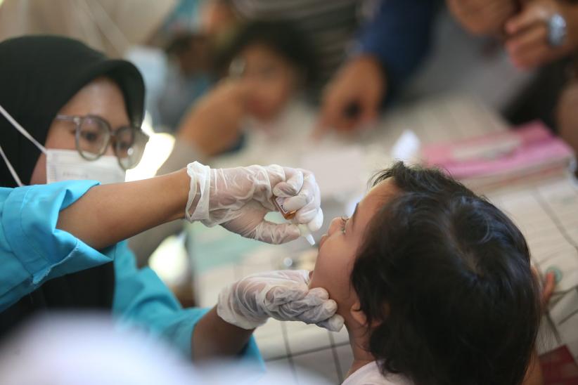Potret Anak-Anak Indonesia Ikuti Imunisasi Polio - Bagian 4