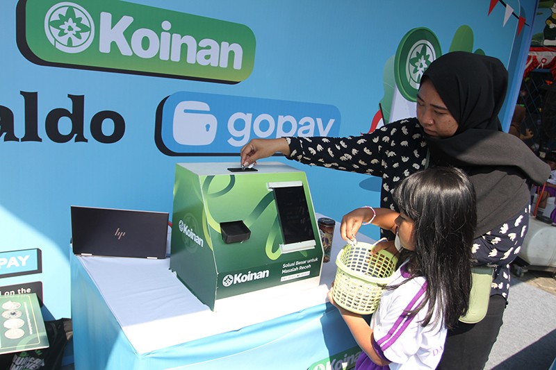 Dorong Transaksi Nontunai, Uang Koin Kini Bisa Jadi Saldo GoPay - Bagian 1
