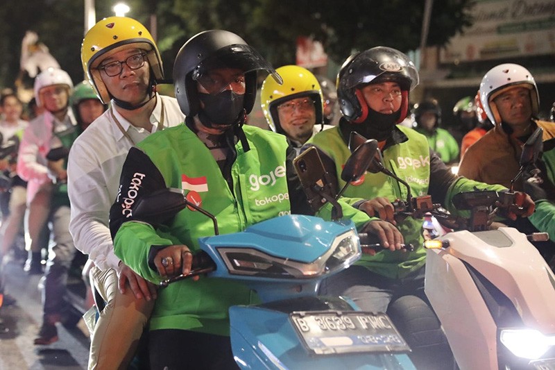 Potret Ridwan Kamil-Suswono Pilih Naik Ojek Online ke KPUD Jakarta - Bagian 3