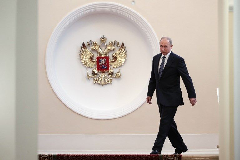 Gaya Vladimir Putin Tiba di Kremlin untuk Dilantik Jadi Presiden Rusia - Bagian 5