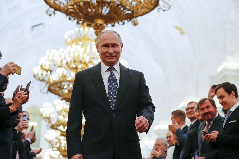 Gaya Vladimir Putin Tiba di Kremlin untuk Dilantik Jadi Presiden Rusia - Bagian 3