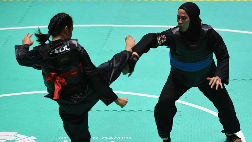 Wajah Lebam Pesilat Indonesia Sarah Tria Monita demi Medali Emas - Bagian 4