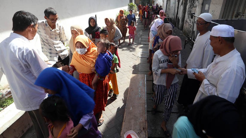 Pengusaha Tekstil Bagikan Zakat Mal kepada 2.000 Warga Surabaya - Bagian 4