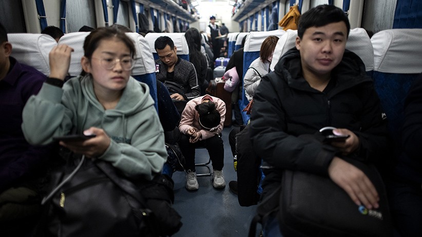 Jutaan Warga China Mudik ke Kampung Halaman untuk Merayakan Imlek - Bagian 4